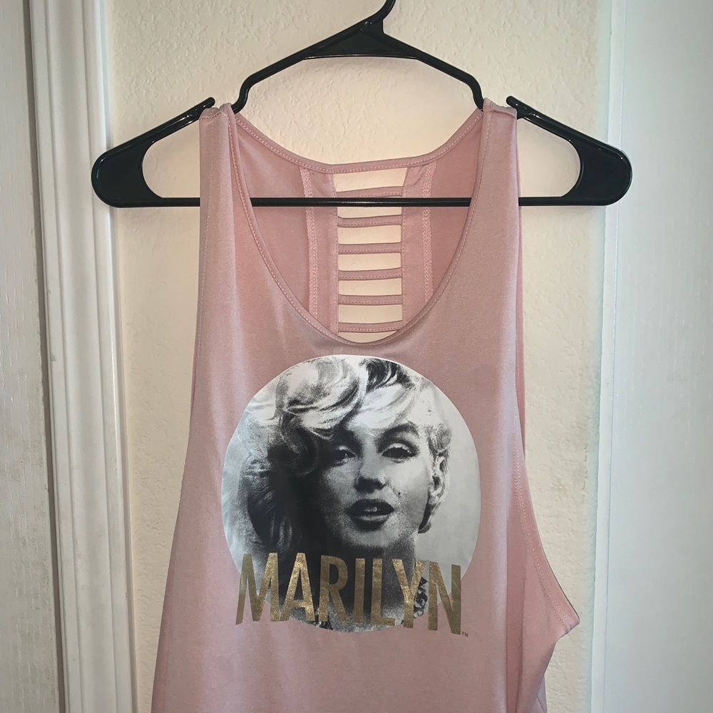 A blush pink tank top.